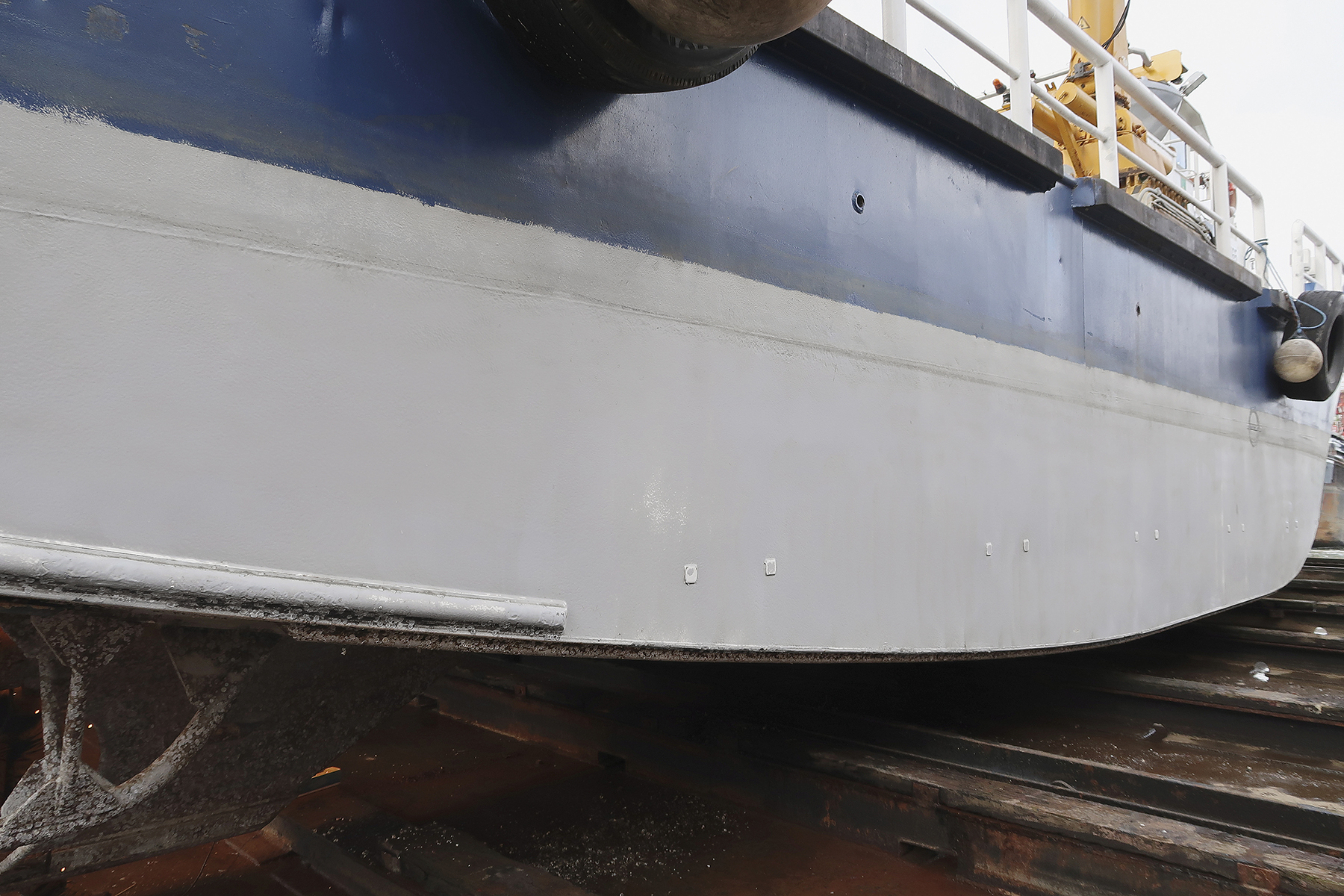 The hull of one of the Hydrex workboats in drydock 10 years after Ecospeed was applied, with no repainting during that interval.