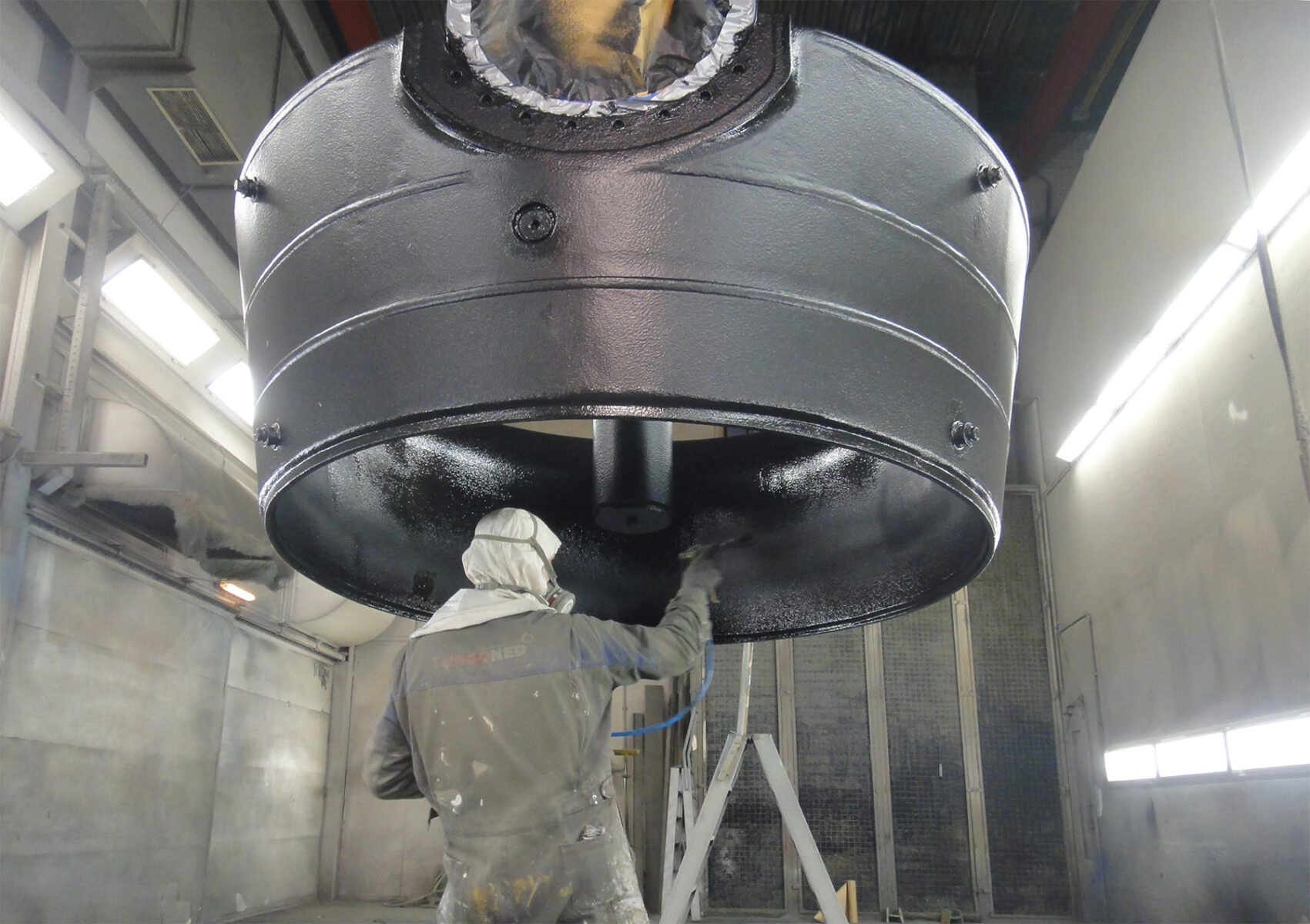 Spraying second coat of Ecoshield on ZF Marine thruster